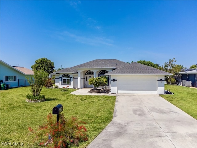 ranch-style home with a front yard and a garage