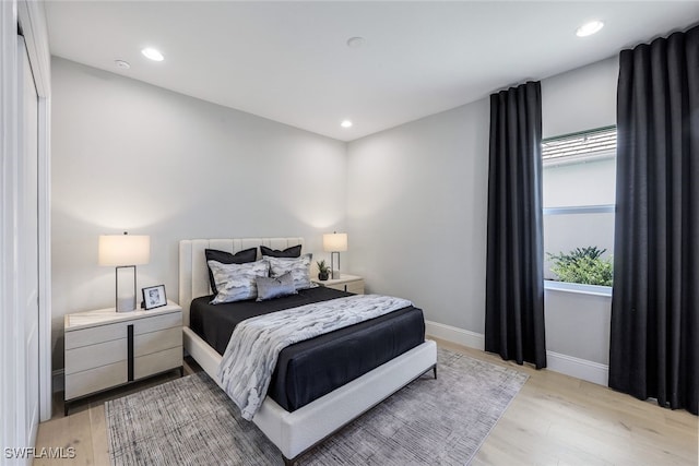 bedroom featuring light hardwood / wood-style floors