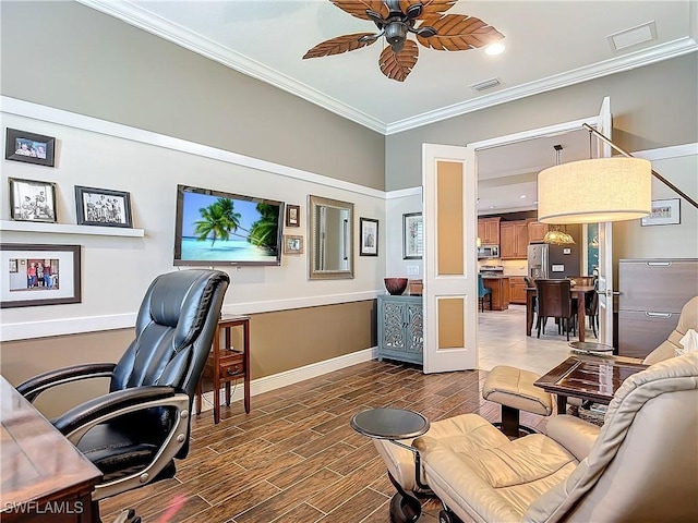 office area with crown molding and ceiling fan