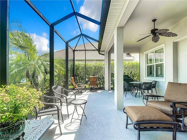 sunroom / solarium with ceiling fan