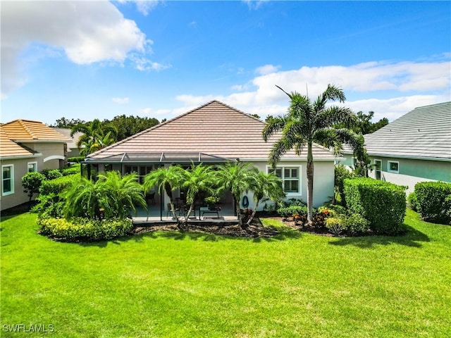 exterior space with a lanai and a patio area