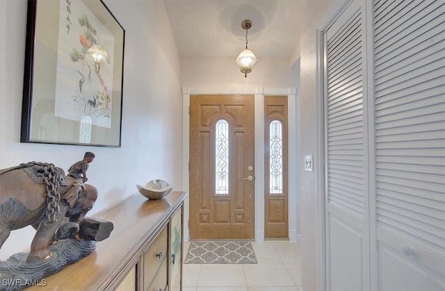 entryway featuring light tile patterned flooring