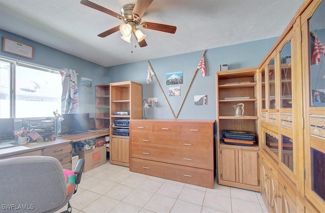 tiled office with ceiling fan