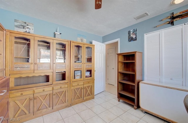 interior space with light tile patterned floors