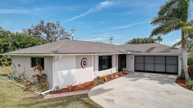 single story home featuring a garage