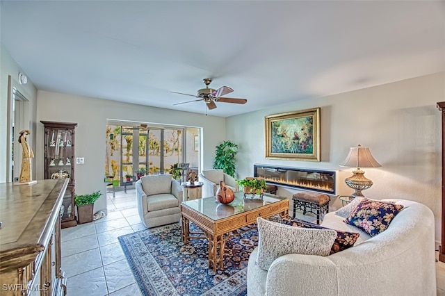 living room featuring ceiling fan and light tile patterned floors