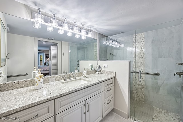 bathroom with vanity and walk in shower