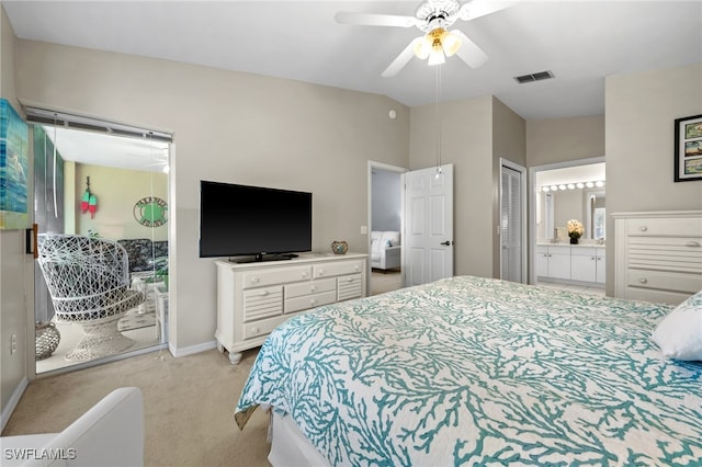 bedroom featuring ceiling fan, ensuite bath, access to outside, and light colored carpet