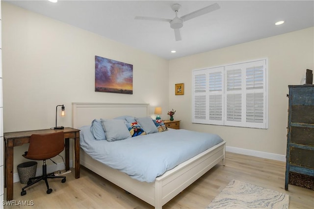 bedroom featuring ceiling fan and light wood-type flooring