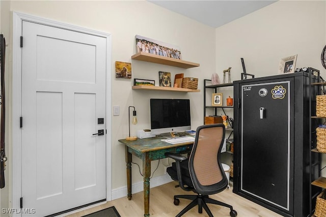 home office featuring light wood-type flooring