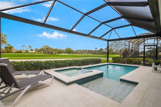 view of pool featuring an in ground hot tub, a lanai, and a patio area