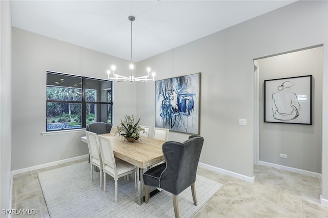 dining room with a chandelier