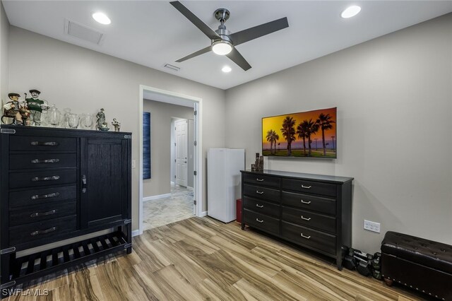 interior space featuring light hardwood / wood-style floors and ceiling fan