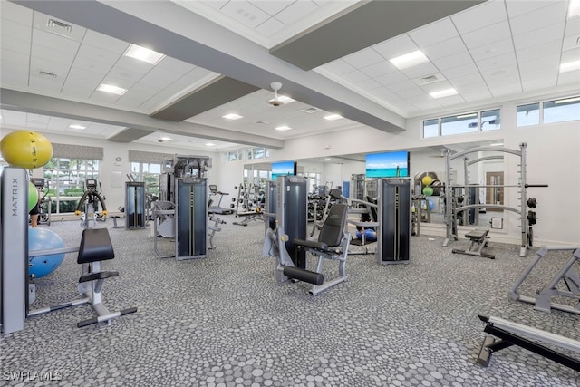 workout area featuring a drop ceiling