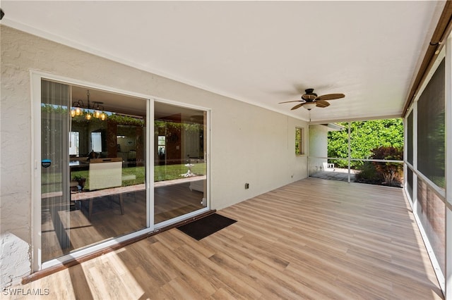 wooden terrace featuring ceiling fan