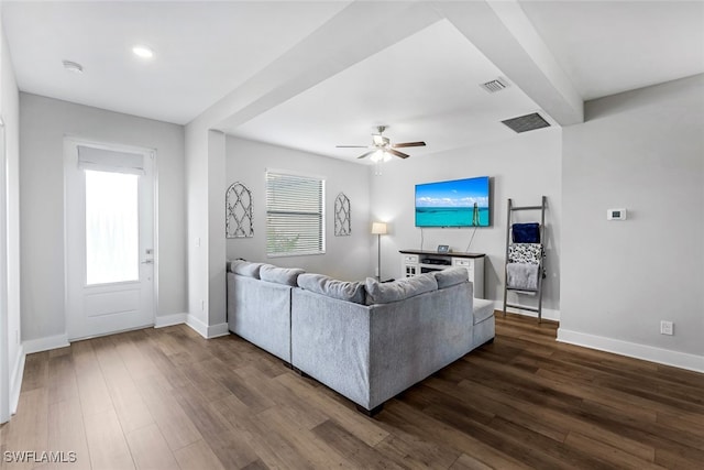 living room with ceiling fan and dark hardwood / wood-style floors