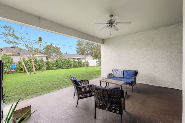 view of patio featuring ceiling fan