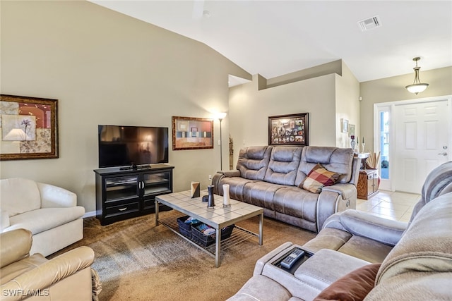 carpeted living room with lofted ceiling