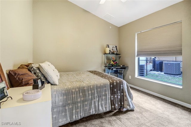 bedroom with lofted ceiling, carpet, and ceiling fan