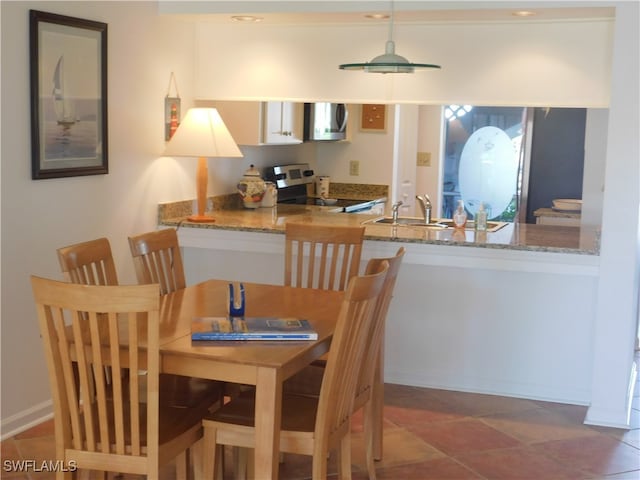 dining room with sink