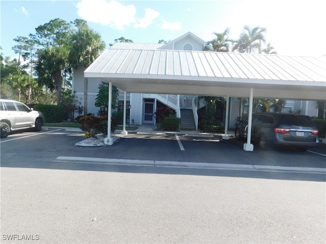 view of parking featuring a carport