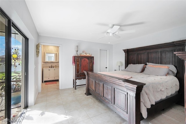 tiled bedroom with ceiling fan, ensuite bath, and access to exterior