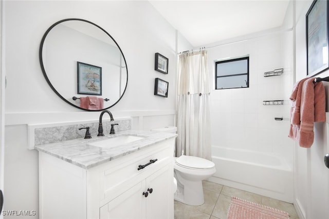 full bathroom with vanity, toilet, tile patterned floors, and shower / bath combo with shower curtain