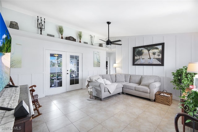 living room with french doors and ceiling fan