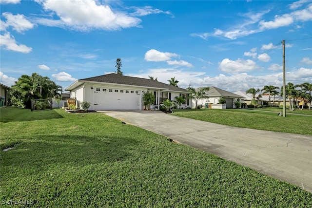 ranch-style home with a front lawn and a garage