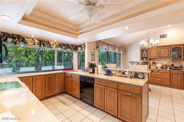 kitchen featuring a healthy amount of sunlight, ornamental molding, dishwasher, and decorative light fixtures