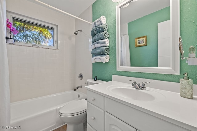 full bathroom featuring shower / tub combo, vanity, and toilet