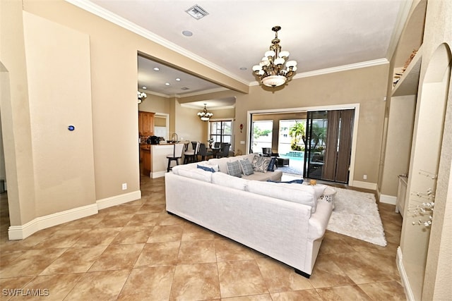 tiled living room with crown molding and an inviting chandelier