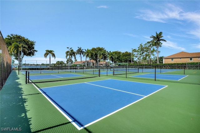 view of tennis court with basketball court