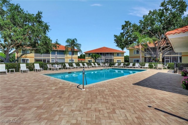 view of pool with a patio area