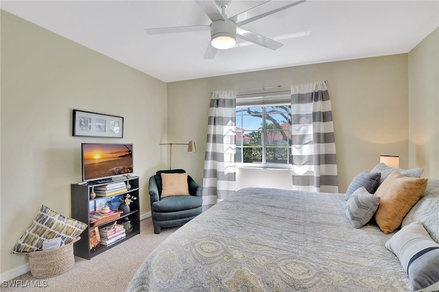 bedroom with ceiling fan and carpet