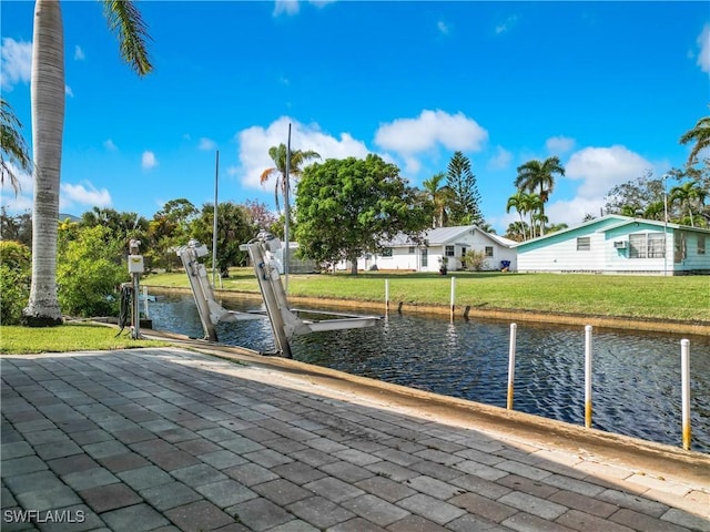 27571 Tarpon Way, Bonita Springs, FL 34134 - view of property's community with a boat dock, a water view, boat lift, and a yard