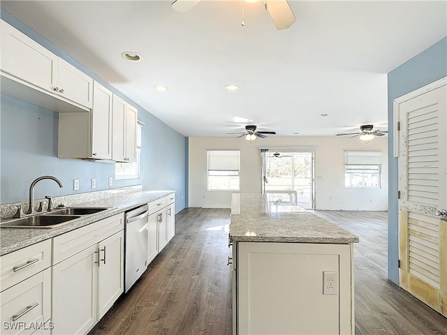 27571 Tarpon Way, Bonita Springs, FL 34134 - kitchen with ceiling fan, stainless steel dishwasher, a center island, dark wood finished floors, and white cabinets