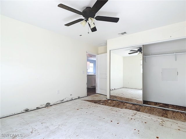 unfurnished bedroom featuring a closet and ceiling fan