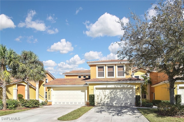 mediterranean / spanish-style home featuring a garage