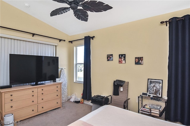 bedroom with vaulted ceiling, carpet flooring, and ceiling fan