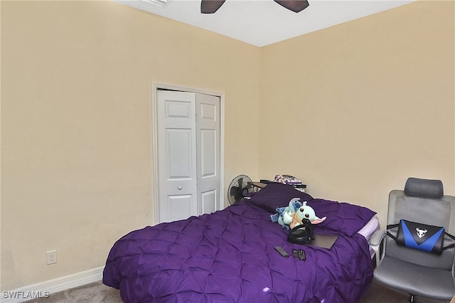 bedroom featuring a closet, carpet flooring, and ceiling fan