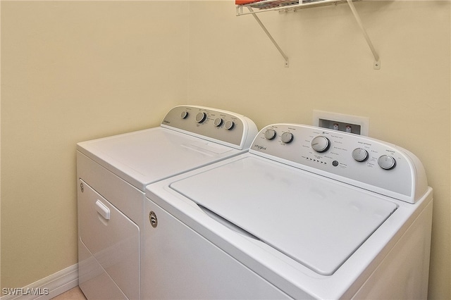 11842 Bayport Ln Unit 2104, Fort Myers, FL 33908 - laundry room featuring washing machine and clothes dryer