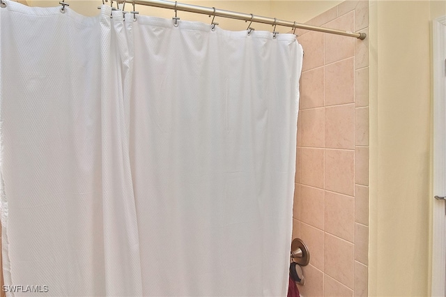 bathroom with curtained shower