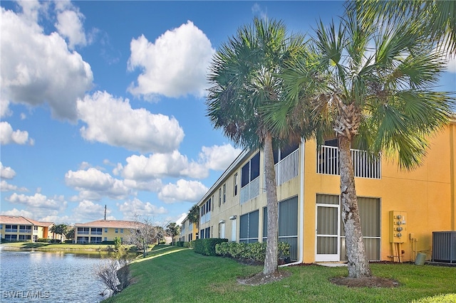 11842 Bayport Ln Unit 2104, Fort Myers, FL 33908 - view of building exterior with central air condition unit and a water view