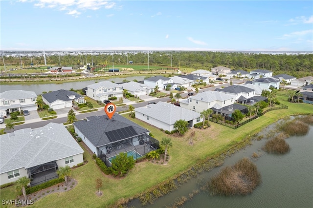 drone / aerial view featuring a water view