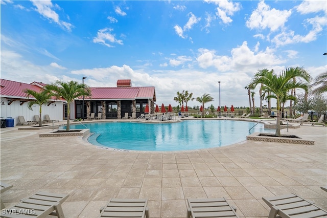 view of pool featuring a patio area