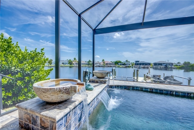 dock area featuring a water view