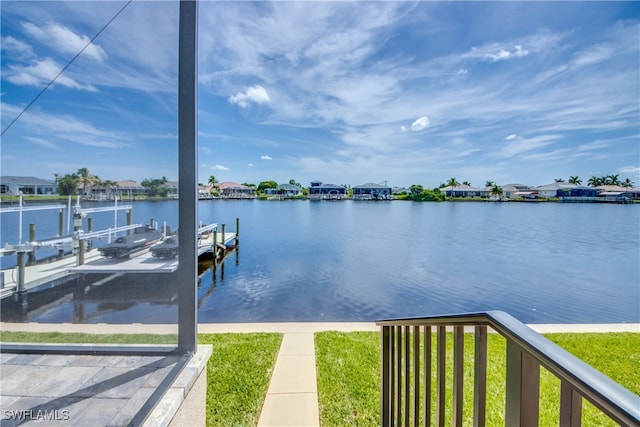 dock area with a water view