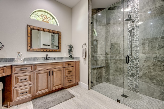 bathroom with vanity and walk in shower