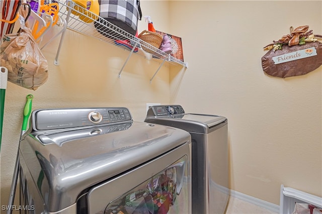 laundry area featuring independent washer and dryer